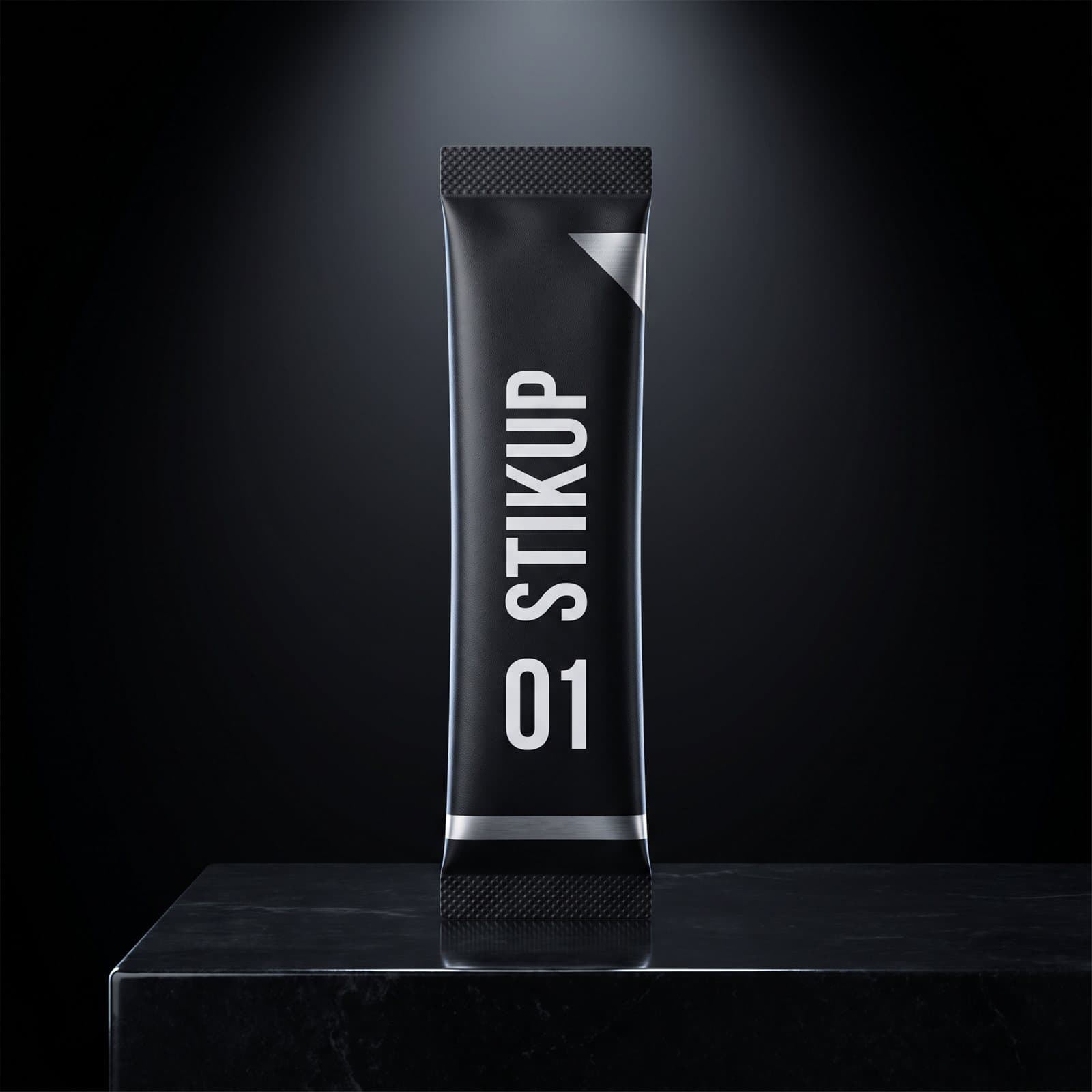 STIKUP 01 Daily Performance stick pack standing on a carbon-black surface